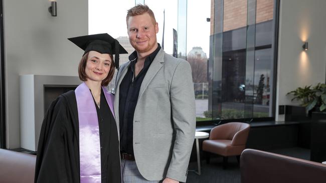 Hillary Martin, graduated with a Graduate Diploma of Counselling, with her partner Will Thomas. Picture: Mireille Merlet