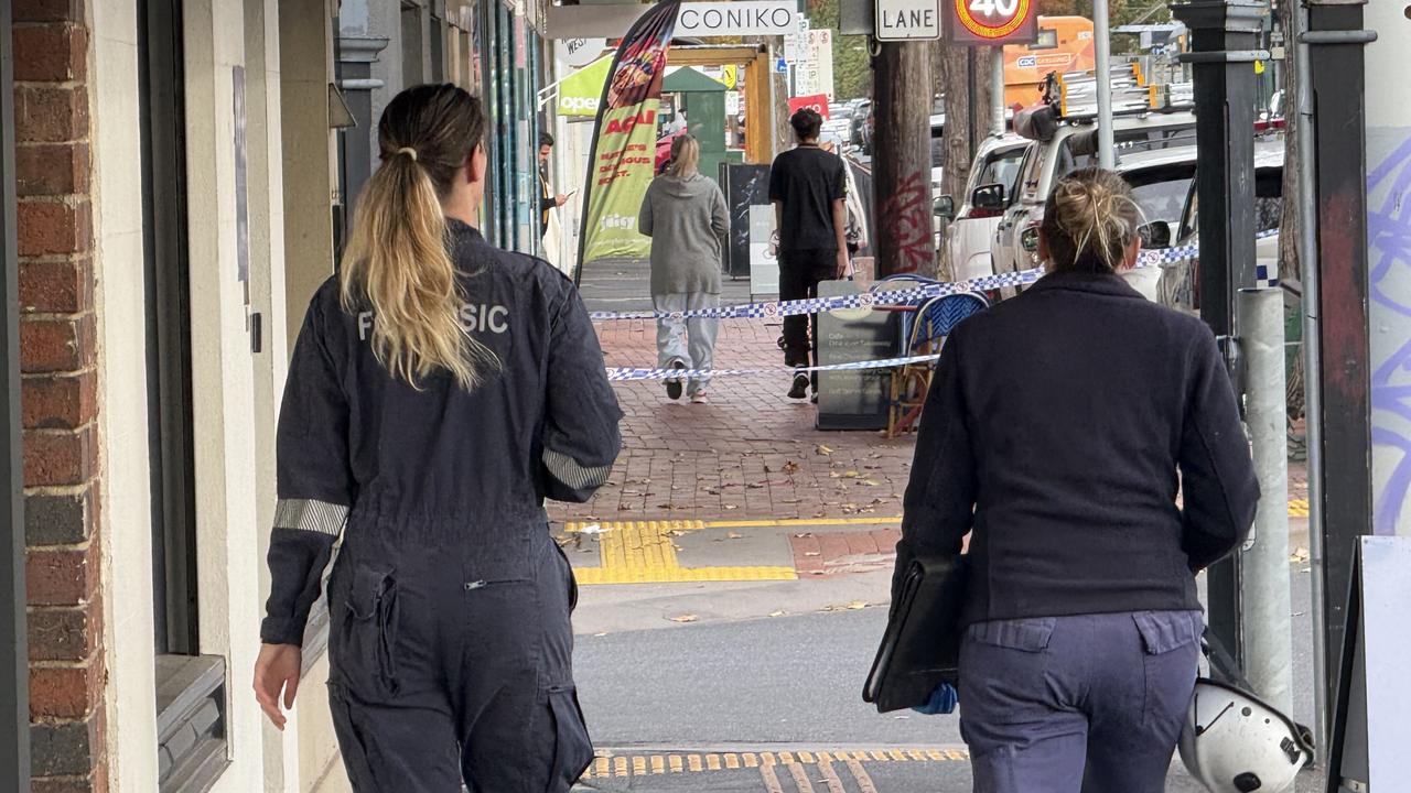 Forensic police on Pakington St this afternoon. Picture: Ryan Bourke