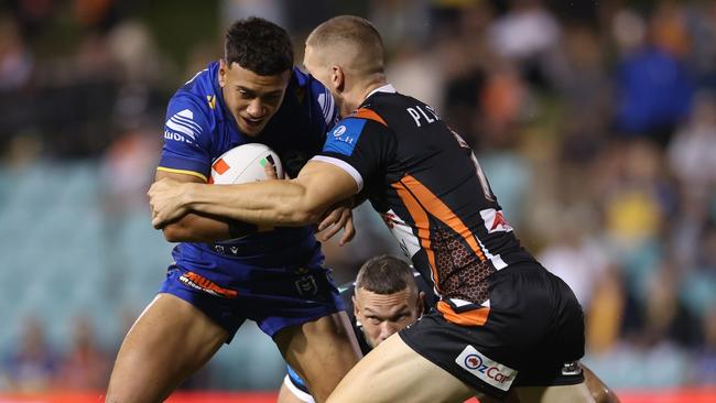 SYDNEY, AUSTRALIA - FEBRUARY 21:  Isaiah Iongi of the Eels is tackled during the 2025 NRL Pre-Season Challenge match between Wests Tigers and Parramatta Eels at Leichhardt Oval on February 21, 2025 in Sydney, Australia. (Photo by Mark Metcalfe/Getty Images)