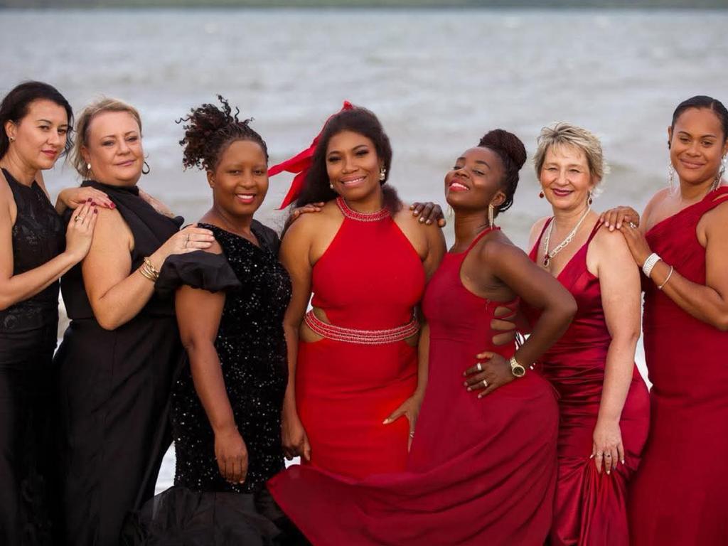 Joy Okobi centre surrounded by Melanie Hamilton, April Marie, Precious Siskhosana, Josephine Spero, Julie Vigor, Esther Tambo Photo: Hayati Photography