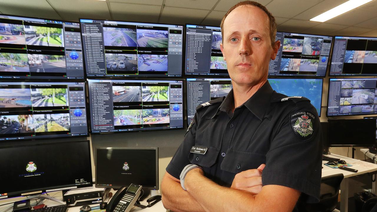 Senior Constable Clint Holdsworth inside the CCTV monitoring and control room at Geelong Police Station. Picture: Alan Barber