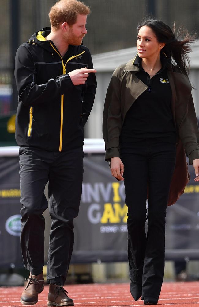 Britain's Prince Harry and his fiancee US actress Meghan Markle arrive to meet participants at the UK team trials for the Invictus Games Sydney 2018. Picture: AFP