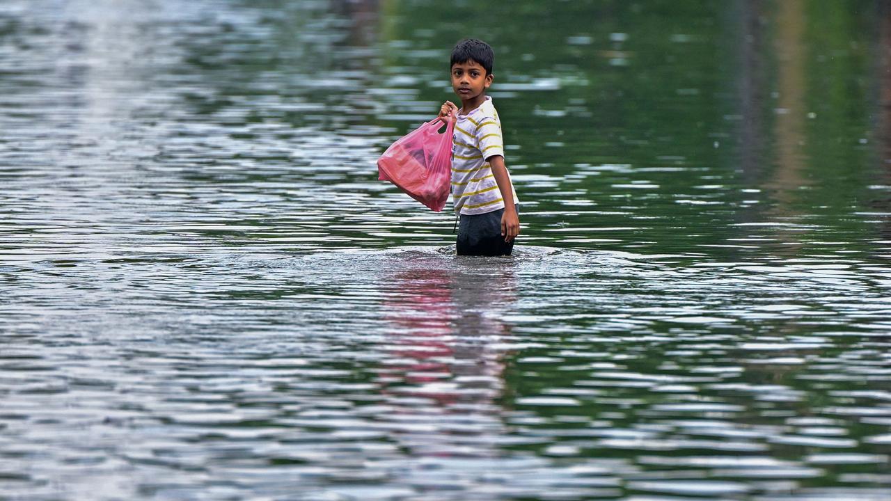 Heavy rain soaks into the ground, making it heavier and more prone to movement. Picture: Ishara S. KODIKARA / AFP