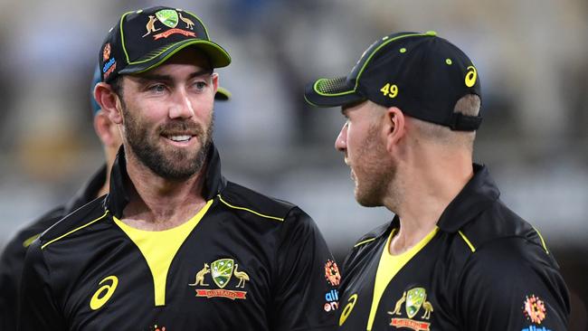 Glenn Maxwell (left) of Australia is seen during the T20 International Series between Australia and Sri Lanka at the Gabba in Brisbane, Wednesday, October 31, 2019. (AAP Image/Darren England) NO ARCHIVING, EDITORIAL USE ONLY