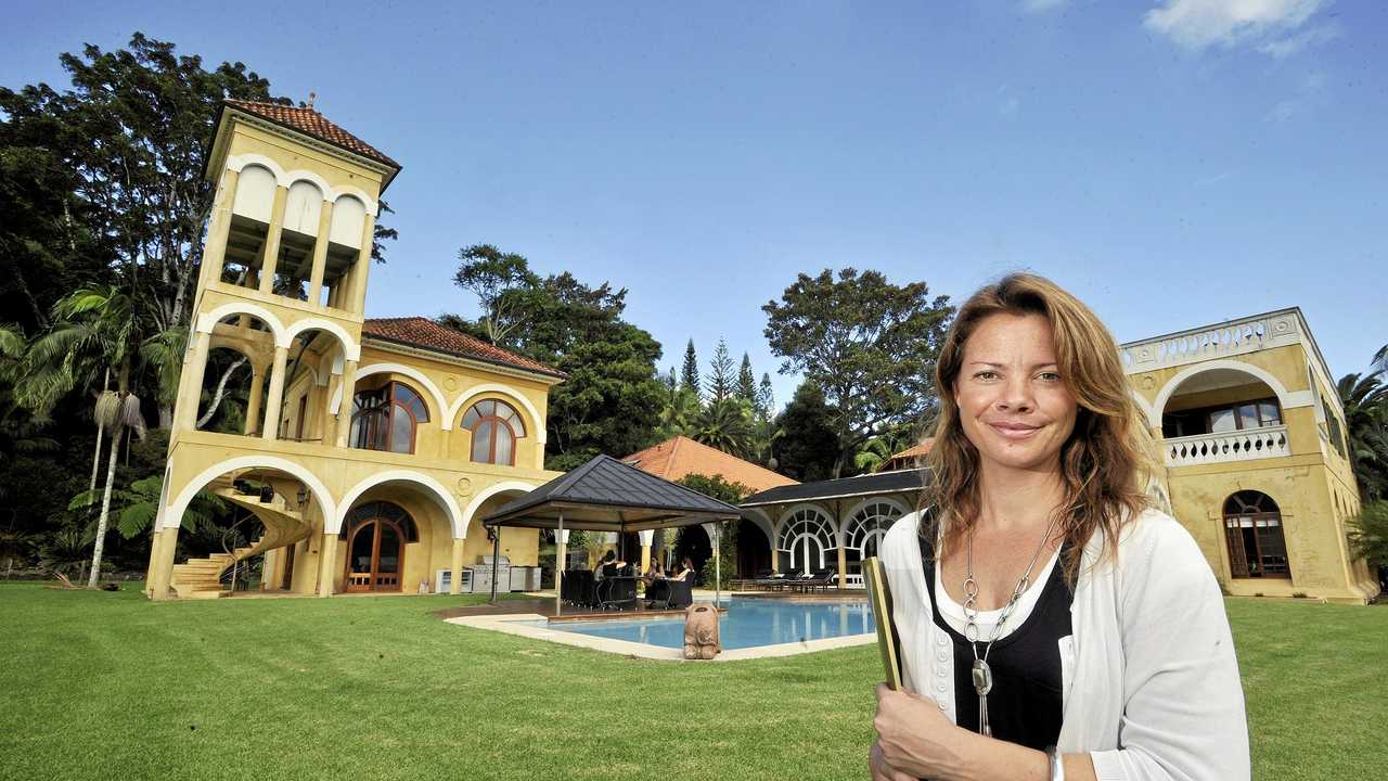 Nicolette van Wijngaarden pictured at one of the properties she sold through Unique Estates before the company crumbled last year. Picture: Cathy Adams