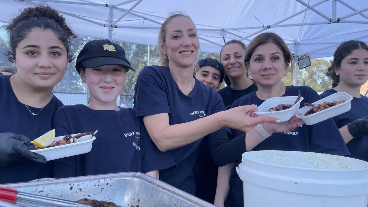 Nancy Notaras (centre) and her team from Fish in the Family kept thousands happy with their octopus dishes.