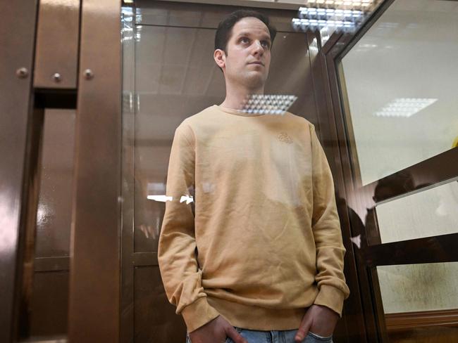 US journalist Evan Gershkovich, arrested on espionage charges, stands inside a defendants' cage at the Moscow City Court in Moscow. Picture: AFP