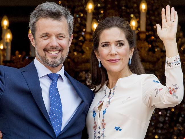 COPENHAGEN, DENMARK - MAY 26: Crown Prince Frederik of Denmark and Crown Princess Mary of Denmark appear on the balcony as the Royal Life Guards carry out the changing of the guard on Amalienborg Palace square on the occasion of the 50th birthday of The Crown Prince Frederik of Denmark on May 26, 2018 in Copenhagen, Denmark. (Photo by Patrick van Katwijk/Getty Images)