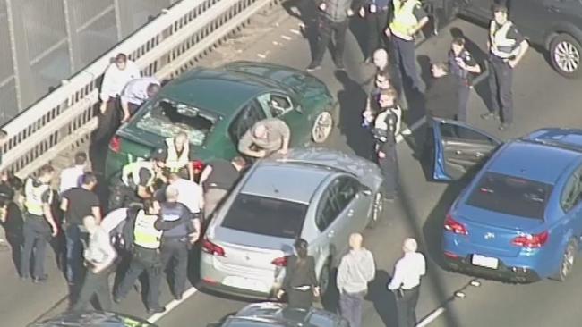 A youth is arrested on the West Gate Bridge.