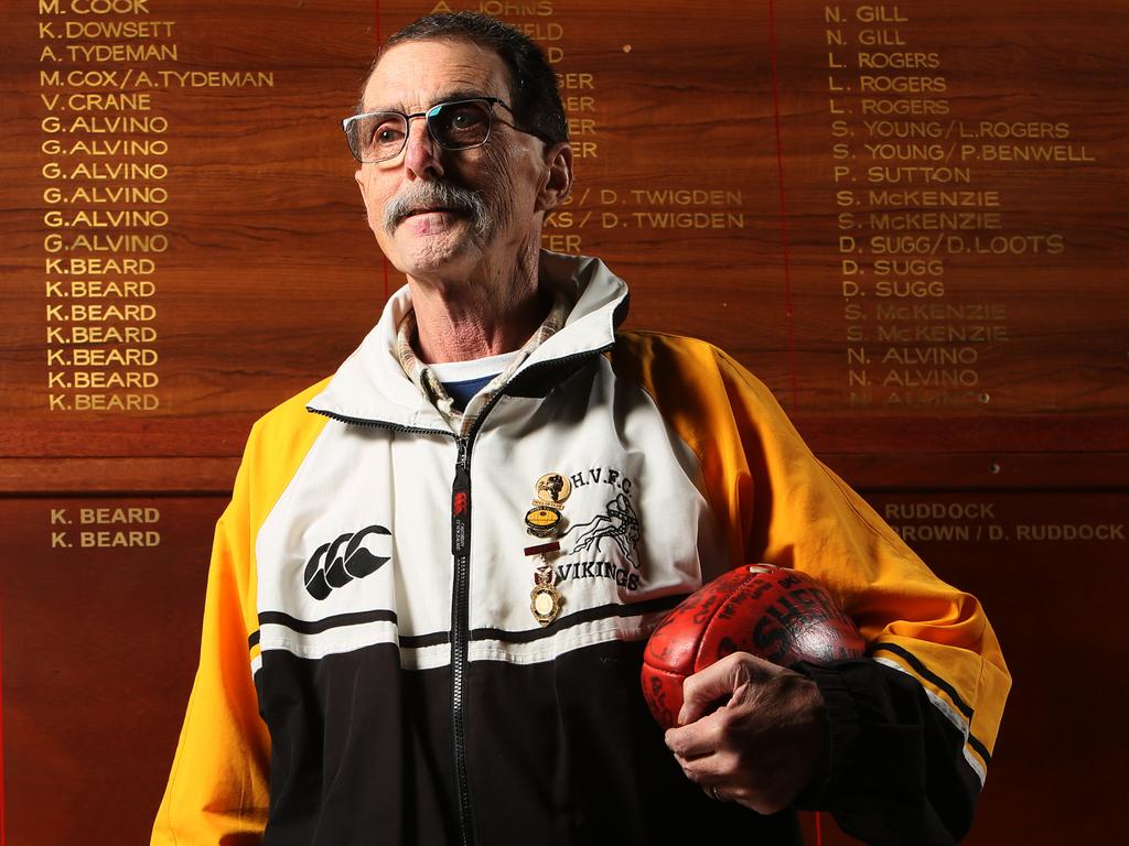 Hank Middleton long serving Happy Valley Football Club and Southern Football League volunteer in front of Football Hall of Fame with signed football, in the Happy Valley Football club. Hank is being honoured by the Club with the change rooms, soon to be named after him. (AAP/Emma Brasier)