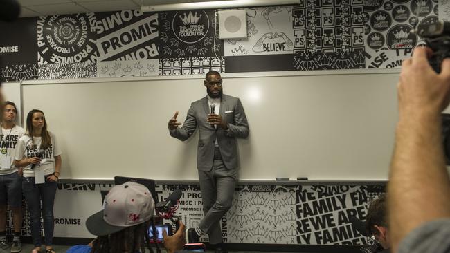 LeBron James addresses the media at his I Promise School in Akron. (AP Photo/Phil Long)