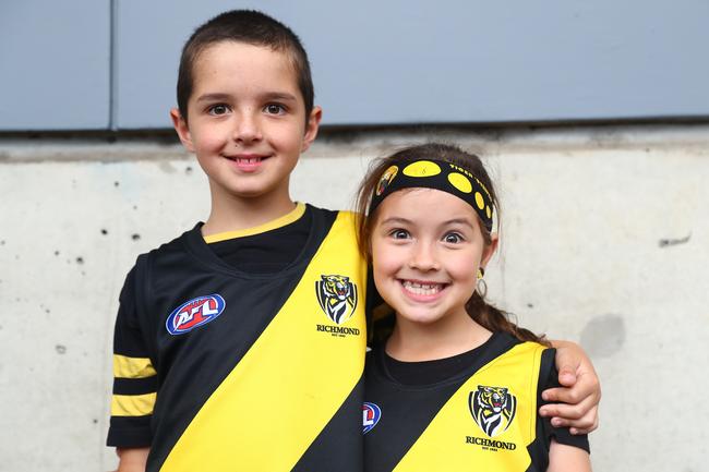 BRISBANE, AUSTRALIA - OCTOBER 24: Tigers fans pose before the 2020 AFL Grand Final match between the Richmond Tigers and the Geelong Cats at The Gabba on October 24, 2020 in Brisbane, Australia. (Photo by Chris Hyde/AFL Photos/via Getty Images)