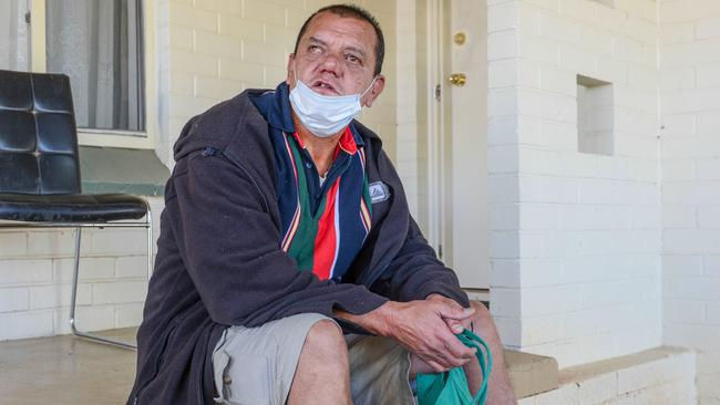 John Henderson, a close friend of bashing victim, sitting on his friends front step in Peacock Rd, Elizabeth Downs. Picture: Brenton Edwards