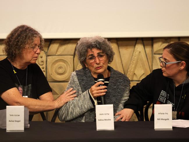 Former hostage Adina Moshe, centre, flanked by Aviva Siege, left, and Nili Margalit. Picture: AFP