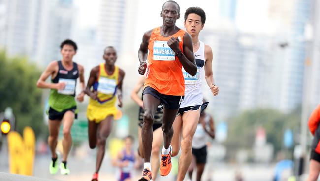 Gold Coast Marathon. Race winner Kenneth Mungara stays just ahead of Japan’s Kenta Murayama in the final stages of the race. Photo by Richard Gosling