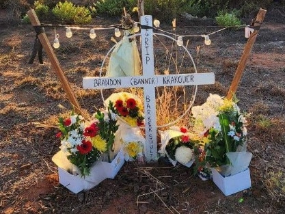 Tributes at the place the men were killed in the crash. Picture: Facebook