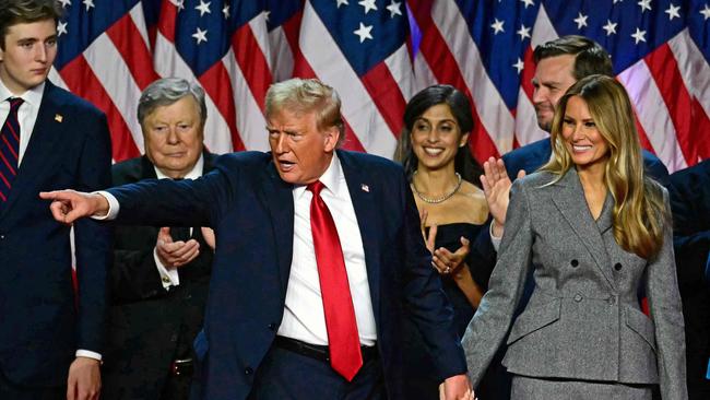 Donald Trump gestures at supporters after speaking at the West Palm Beach Convention Centre.