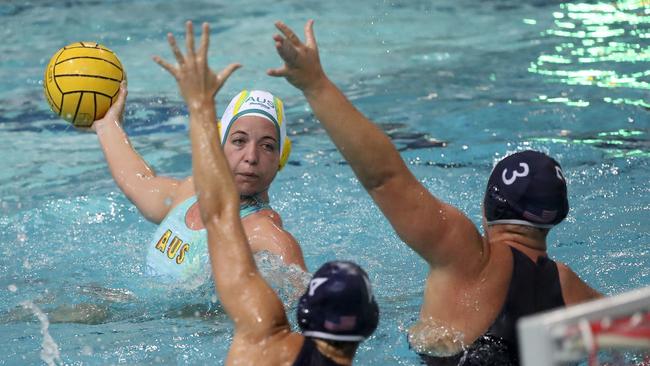 Zoe Arancini of Australia takes a shot at goal during the Water Polo Test Match between Australia and USA at the Brisbane Aquatic Centre in Brisbane, Saturday, January 18, 2020. (AAP Image/Glenn Hunt)