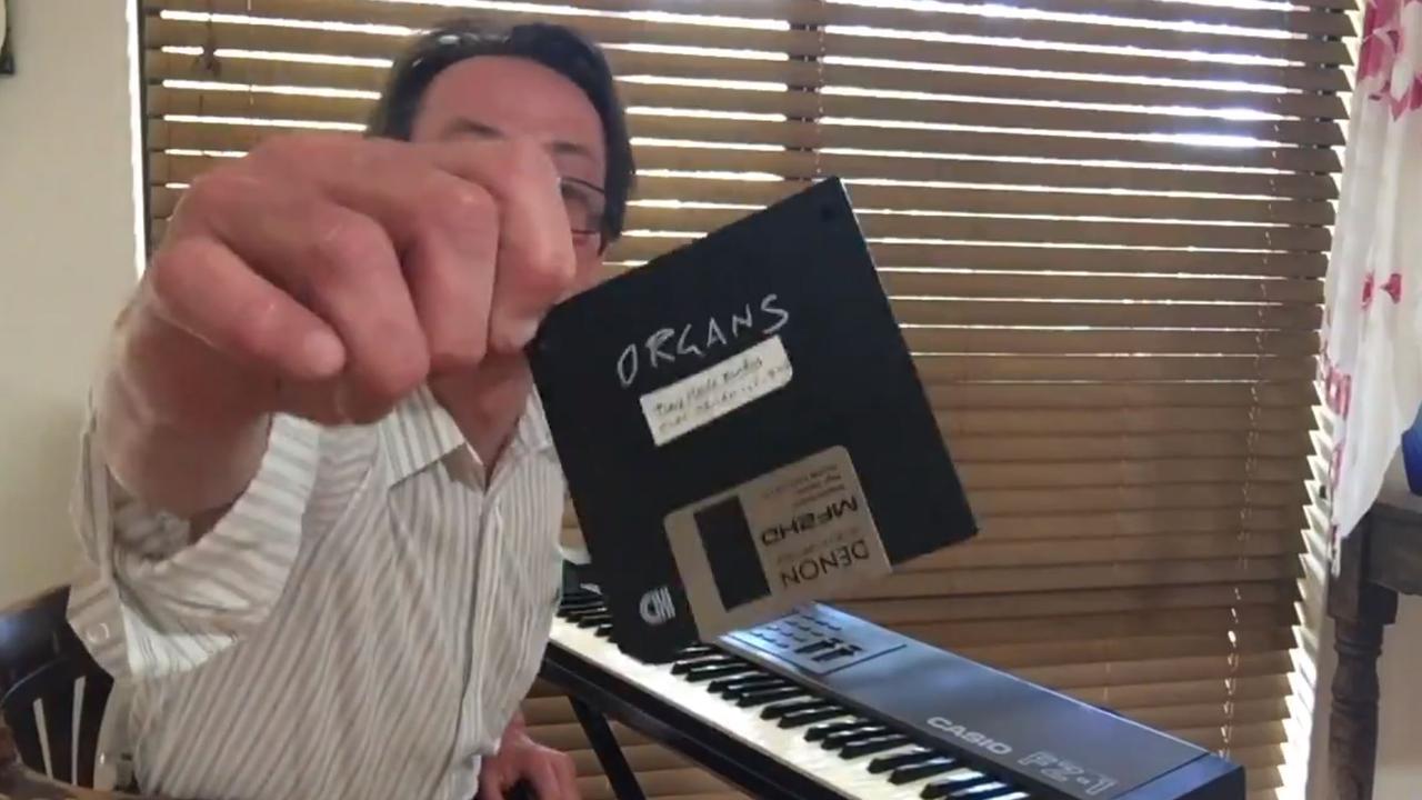 He showed the original floppy disk he'd been working with that day. Picture: GruenHQ