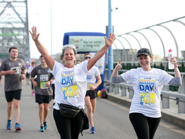 Sheila Levine and Tammi Favorato make their way across Story Bridge in 2017. Picture: AAP Image/Mark Calleja