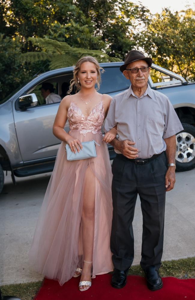 Olivia with her special escort at the Glasshouse Christian College formal. Picture: Jordan Bull of JBull Photography