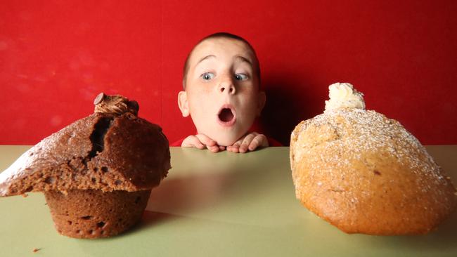 Muffins are getting bigger, but Julian Patestos, 5, doesn’t mind.