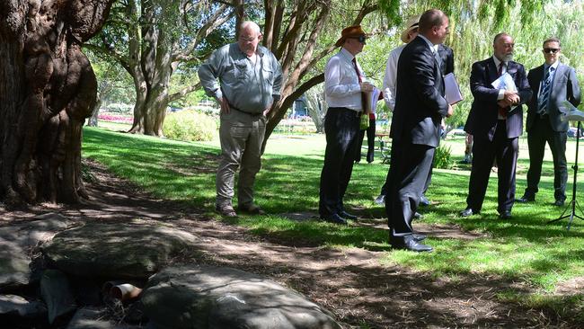 Peter Dansie (left) looks at the pond where his wife drowned as court staff involved in his trial visit the scene of Helen Dansie’s death. Picture: AAP Image/Sam Wundke