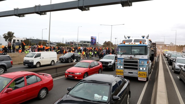 Construction workers protest along the West Gate Freeway on September 21, 2021 in Melbourne. Picture: Getty Images