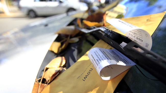 Generic photographs of parking tickets, City of Sydney (Surry Hills). Ranger, fine, car,