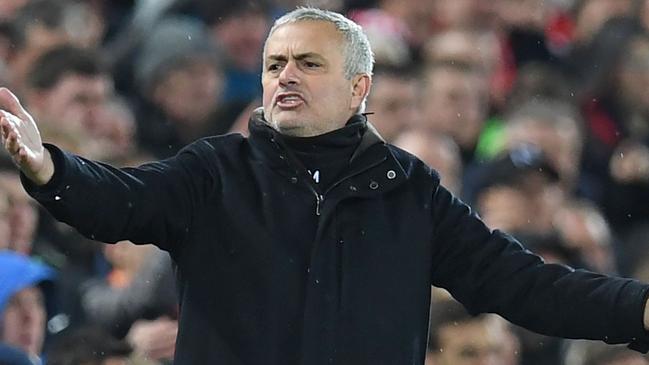 Manchester United's Portuguese manager Jose Mourinho gestures on the touchline during the English Premier League football match between Liverpool and Manchester United at Anfield in Liverpool, north west England on December 16, 2018. (Photo by Paul ELLIS / AFP) / RESTRICTED TO EDITORIAL USE. No use with unauthorized audio, video, data, fixture lists, club/league logos or 'live' services. Online in-match use limited to 120 images. An additional 40 images may be used in extra time. No video emulation. Social media in-match use limited to 120 images. An additional 40 images may be used in extra time. No use in betting publications, games or single club/league/player publications. /