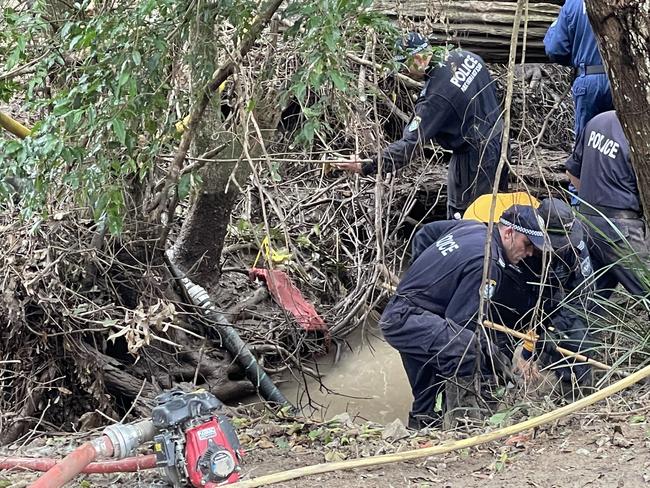 Investigators searching for the remains of William Tyrrell have plucked a faded red piece of material from a drained creek, as investigators hone in on the muddy waterway in their hunt to solve the little boy’s disappearance. Police began Monday afternoon digging through the mud of a new section of pumped-out creek under the watchful eye of Detective Chief Inspector David Laidlaw, the man who has helmed the investigation into the boy’s disappearance for the last two years.