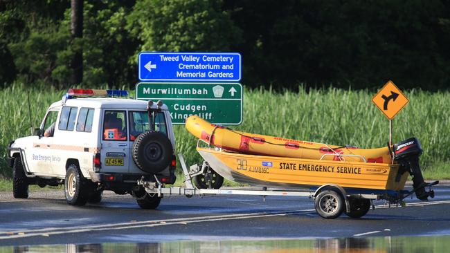 Murwillumbah SES Emergency Flood Recue Team sits waitng to assist drivers stupid enough to drive through flooded Tweed Valley Way at Stotts Island.Photo Scott Powick Daily News