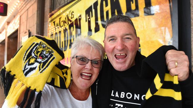 Richmond supporters Peter and Sue Smith lining up for AFL Grand Final tickets in Exhibition Street. Picture: Josie Hayden