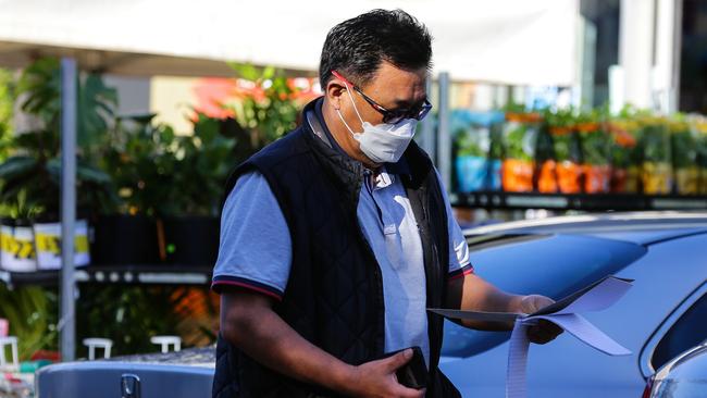 Customers at the Willoughby Harris Farm store seen wearing masks. Harris Farm management has urged shoppers and staff to wear masks as a precaution. Picture: Gaye Gerard