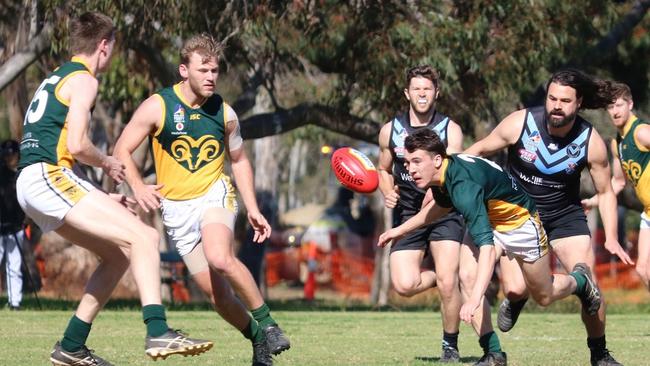 Action from the Marion v Blackfriars Old Scholars division six Adelaide Footy League game. Picture: Andrew Supple