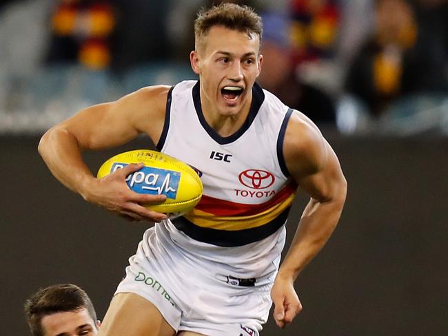 MELBOURNE, AUSTRALIA - JUNE 16: Tom Doedee of the Crows in action during the 2018 AFL round 13 match between the Hawthorn Hawks and the Adelaide Crows at the Melbourne Cricket Ground on June 16, 2018 in Melbourne, Australia. (Photo by Michael Willson/AFL Media/Getty Images)