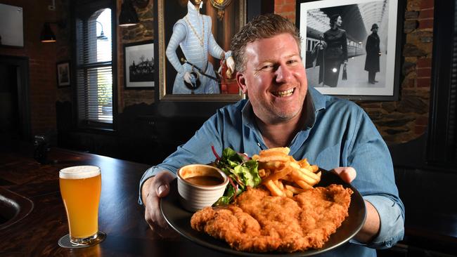 Earl of Leicester at Parkside has won the vote of the best schnitzel in Adelaide – getting almost 20 per cent of the 1200 votes. Publican Piers Schmidt is pictured with one of his winning schnitties. Picture: Tricia Watkinson