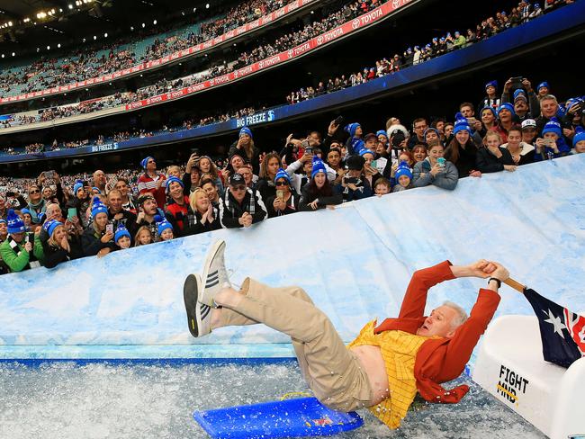 Andrew Gaze in his 2000 Sydney Olympics uniform taking a dip. Picture: Mark Stewart