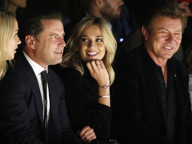 Karl Stefanovic, girlfriend Jasmine, and Richard Wilkins in the front row for the Justin Cassin show. Picture: David Swift