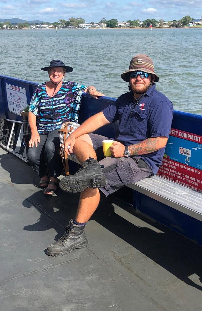 Amity Trader crew member Jairyn Buckney shares a cuppa with a customer before coronavirus restrictions. Picture: Amity Trader