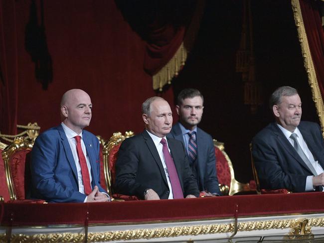 Russian President Vladimir Putin, center, FIFA President Gianni Infantino, left, and Director of the Bolshoi Theater Vladimir Urin, right, attend the gala-concert dedicated to the closing of FIFA Soccer World Cup at the Bolshoi Theater in Moscow, Russia, Saturday, July 14, 2018. (Alexei Druzhinin, Sputnik Kremlin via AP, Pool)