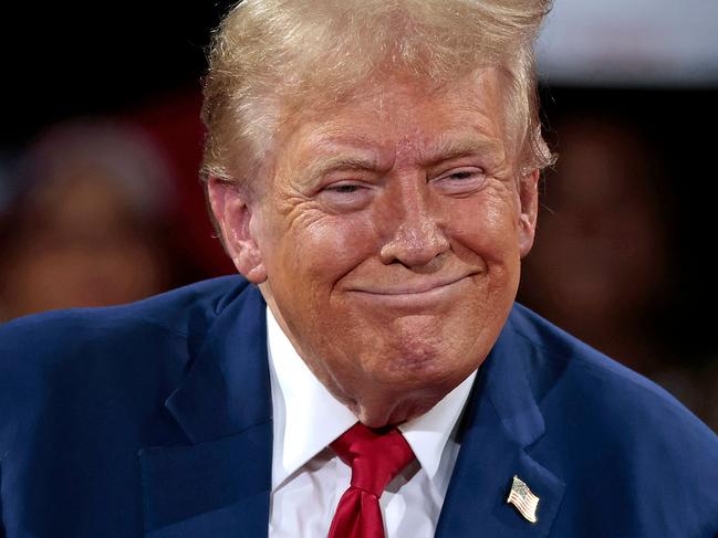 Former US President and Republican presidential candidate Donald Trump attends a town hall meeting moderated by Arkansas Governor Sarah Huckabee Sanders at the Dort Financial Center in Flint, Michigan. Picture: AFP