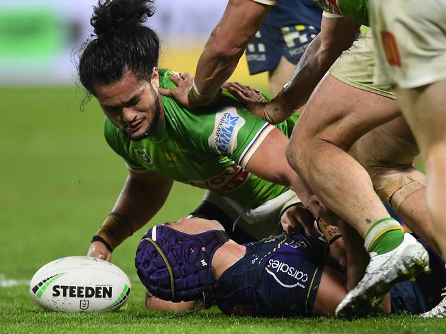 SUNSHINE COAST, AUSTRALIA - AUGUST 12: Jahrome Hughes  of the Storm suffers a concussion after a tackle during the round 22 NRL match between the Melbourne Storm and the Canberra Raiders at Sunshine Coast Stadium, on August 12, 2021, in Sunshine Coast, Australia. (Photo by Albert Perez/Getty Images)