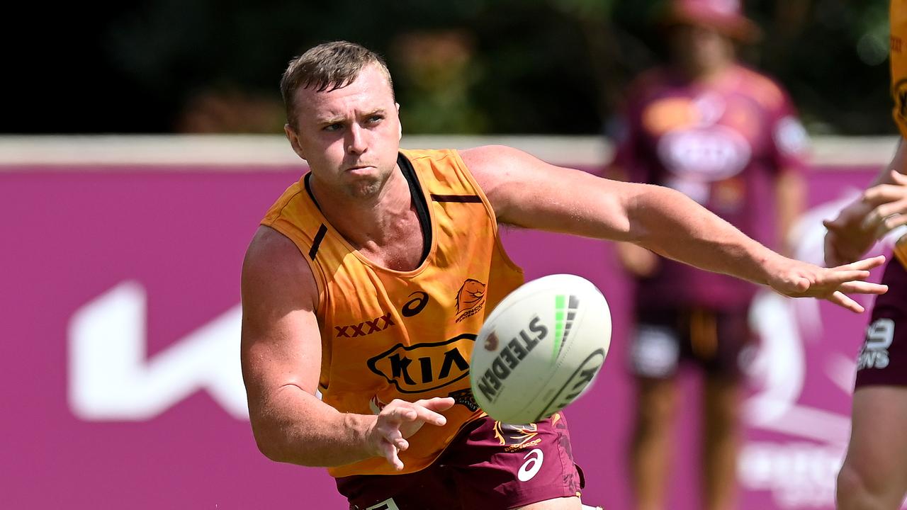 Jake Turpin passes the ball during a Brisbane Broncos NRL training session