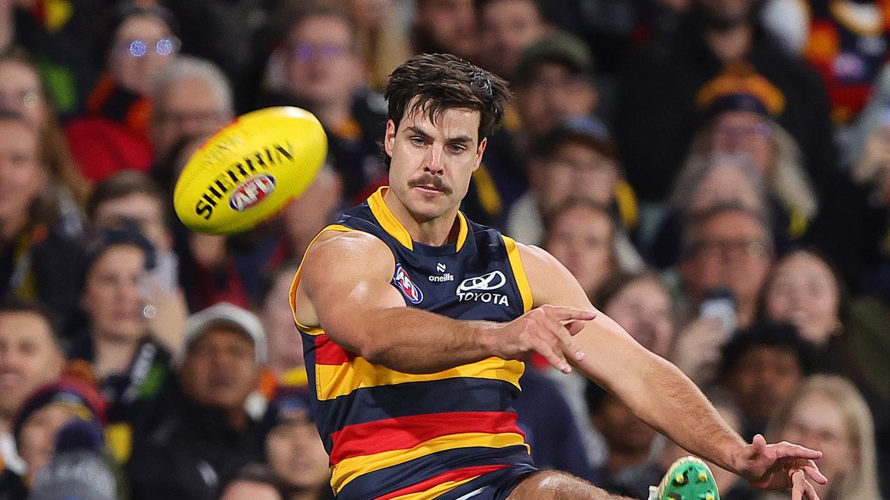 Darcy Fogarty snaps at goal. (Photo by Sarah Reed/AFL Photos via Getty Images)