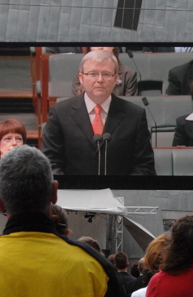 An audience watches the broadcast of Prime Minister Kevin Rudd's apology to Indigenous people screened at Federation Square in Melbourne on February 13, 2008.