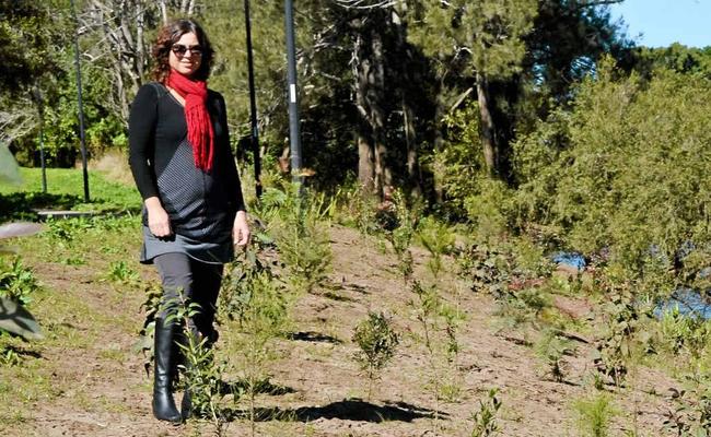 RIVER REVIVER: Environment strategies officer for Lismore Vanessa Tallon among the newly-planted native trees along Wilsons River. Picture: Samantha Elley