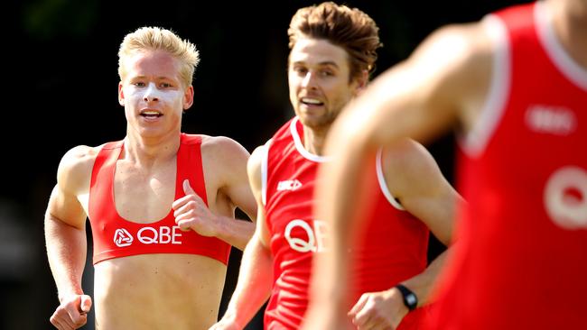 Isaac Heeney, left, during a Sydney pre-season running session. Picture: Phil Hillyard