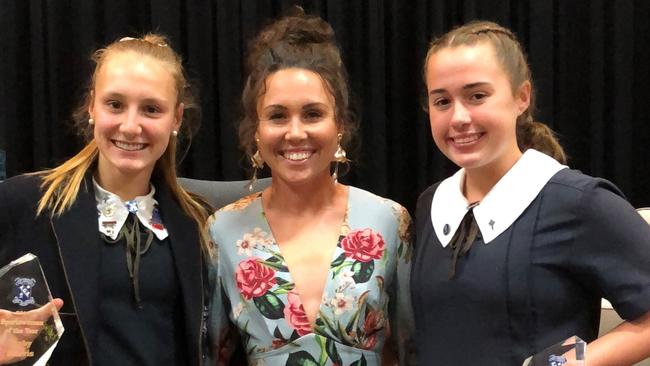 St Aidan's Ruby Harris, left, won Sportswoman of the Year and Angelina Tignani the college Junior Sportswoman of the Year. Here they are pictured with guest speaker Chloe Esposito.