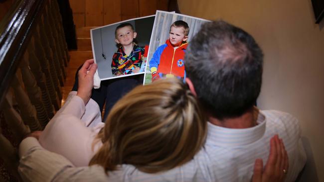 William Tyrrell's foster parents looking at pictures of their missing son 2016 in Sydney.